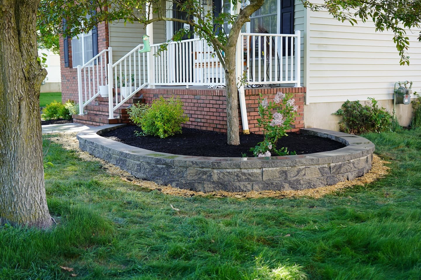 Garden retaining wall with block and landscape planting
