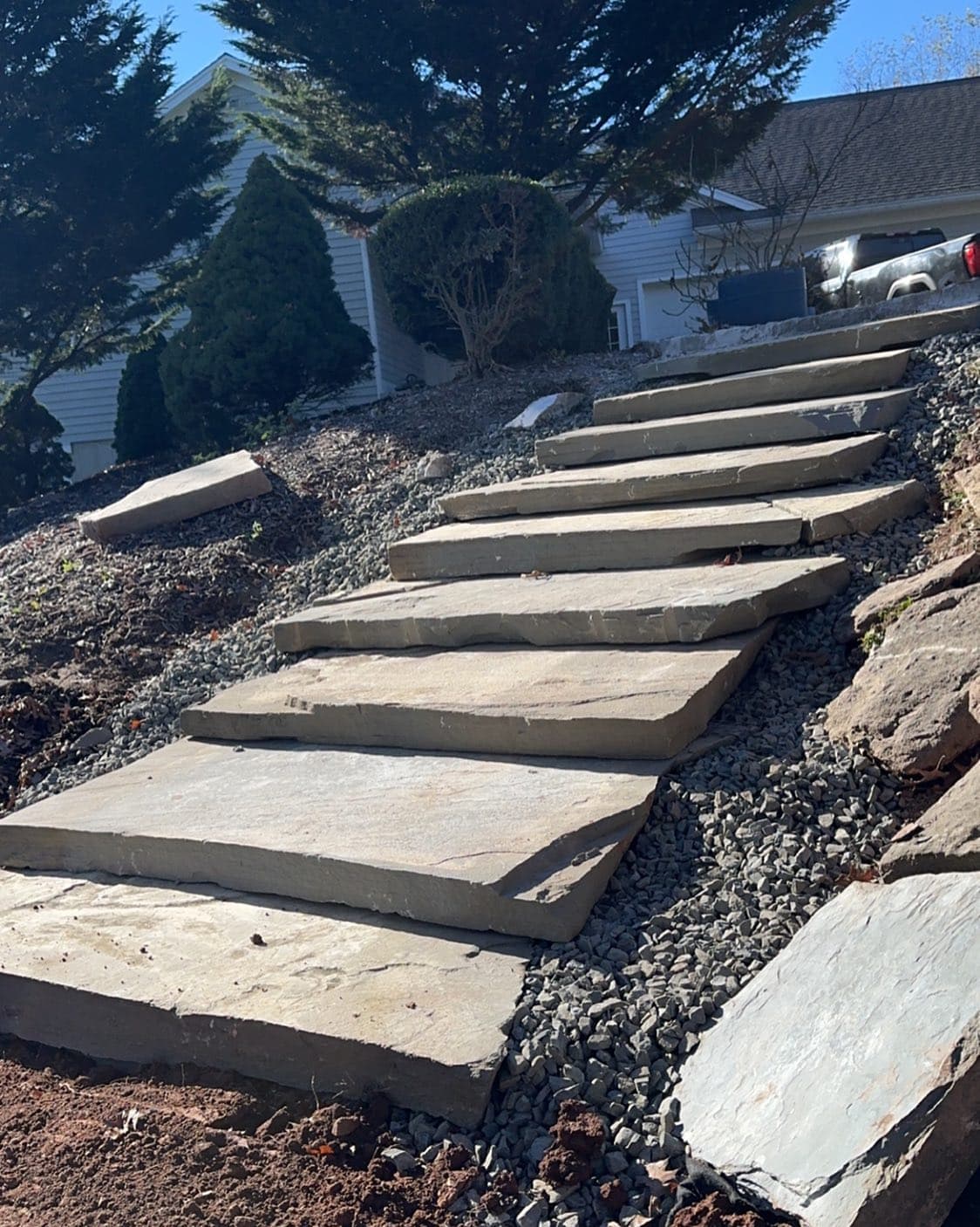 Natural stone steps built into hillside