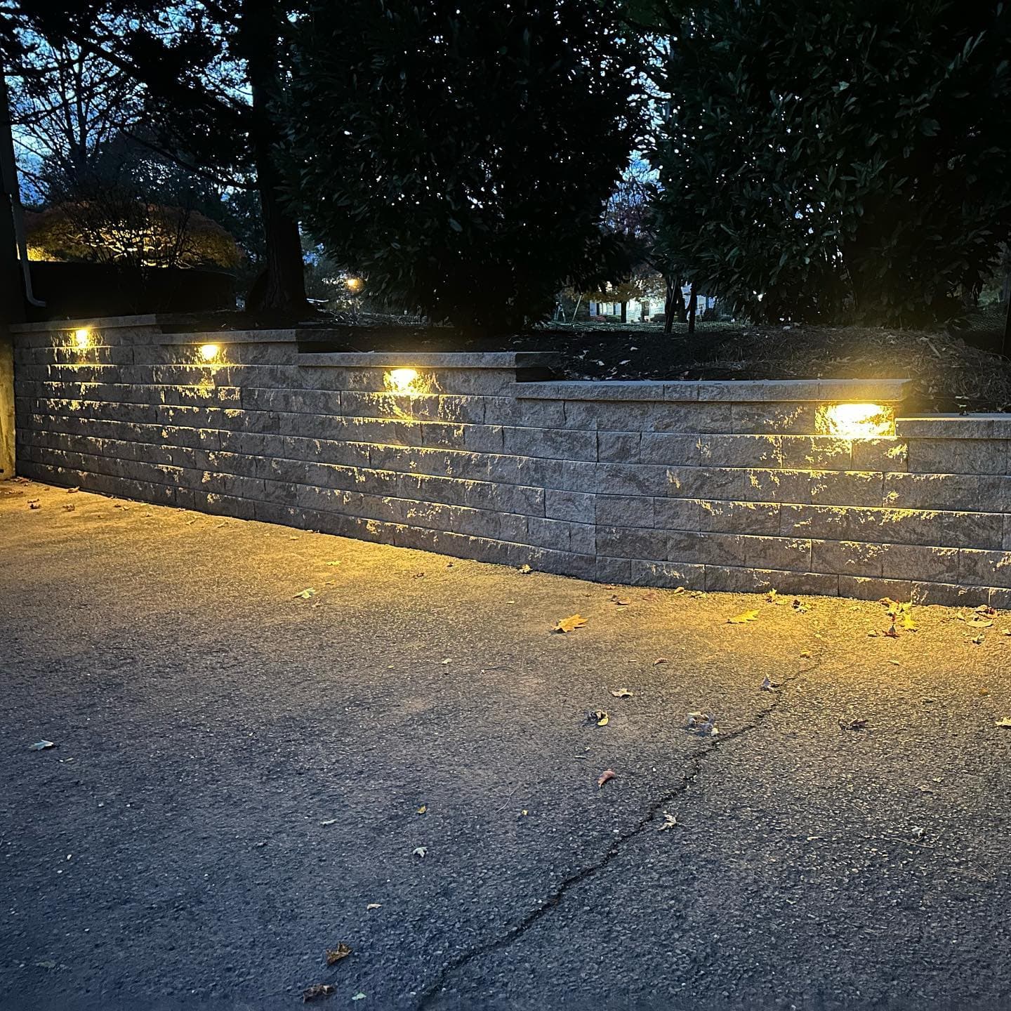 Retaining wall with integrated lighting at night