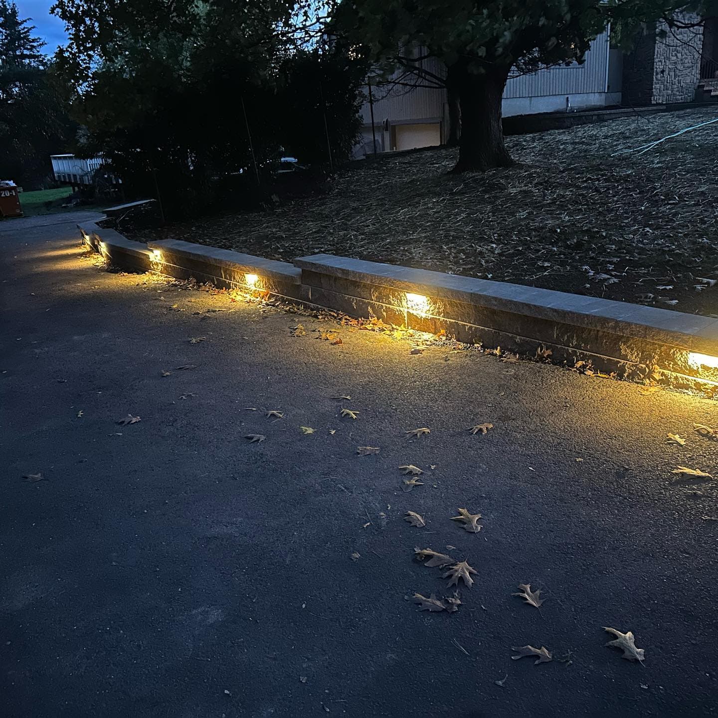 Retaining wall with integrated lighting at night