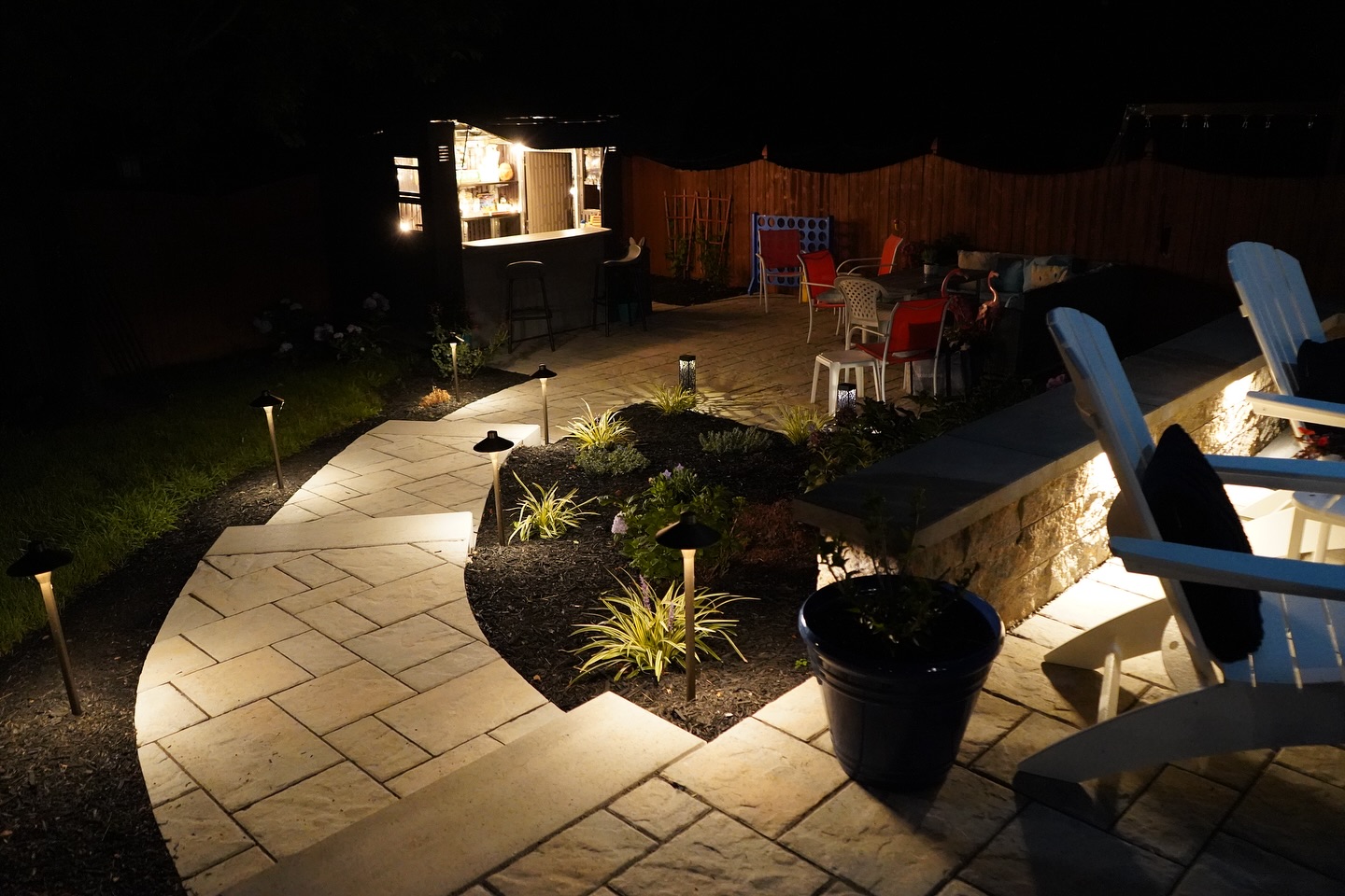 Illuminated walkway with landscape lighting